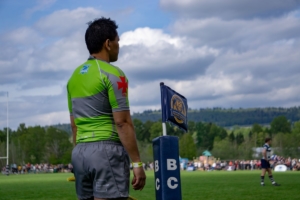 A referee looks on from the line
