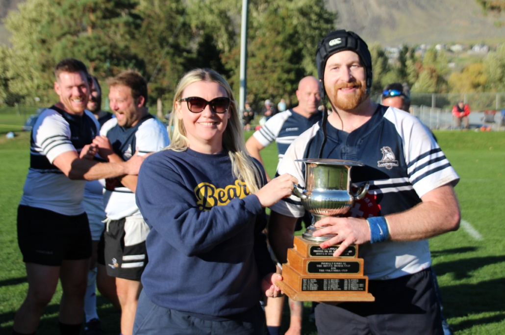 BC Rugby CEO Annabel Kehoe presents the Saratoga Cup to Rocky Mountain Rogues