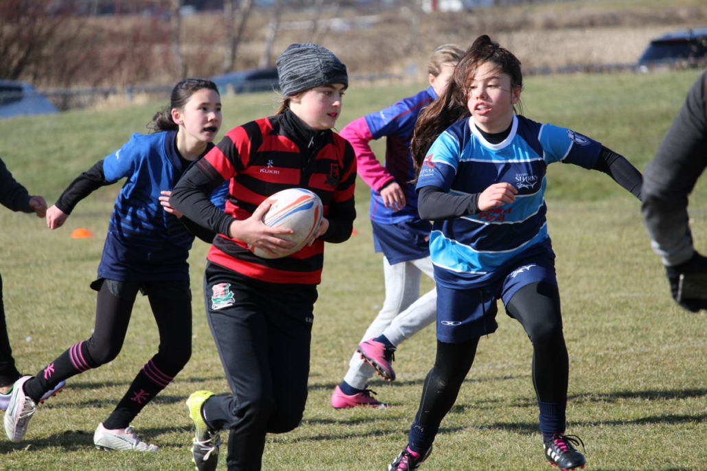 A girls Rugby match between Brit Lions and Bayside