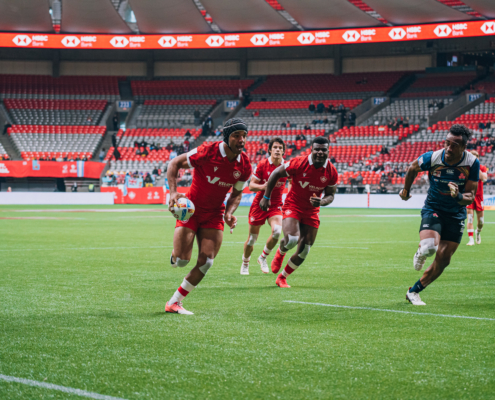 Canada's Anton Ngongo breaks away to score a try at BC Place