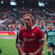 Rugby Canada player Jake Thiel screams in delight