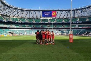 The Rugby Canada Senior Men's Sevens teams huddles during a practice at Twickenham Stadium in London
