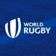 A white World Rugby logo on a blue background