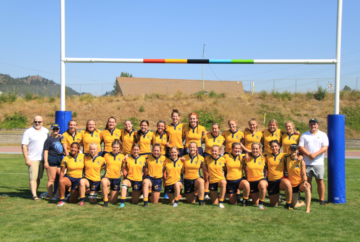 BC Bears U18 Girls team poses for a photo underneath the posts
