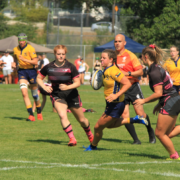 A BC Bears U16 Girls player runs with the ball during a match against the Alberta Wolfpack