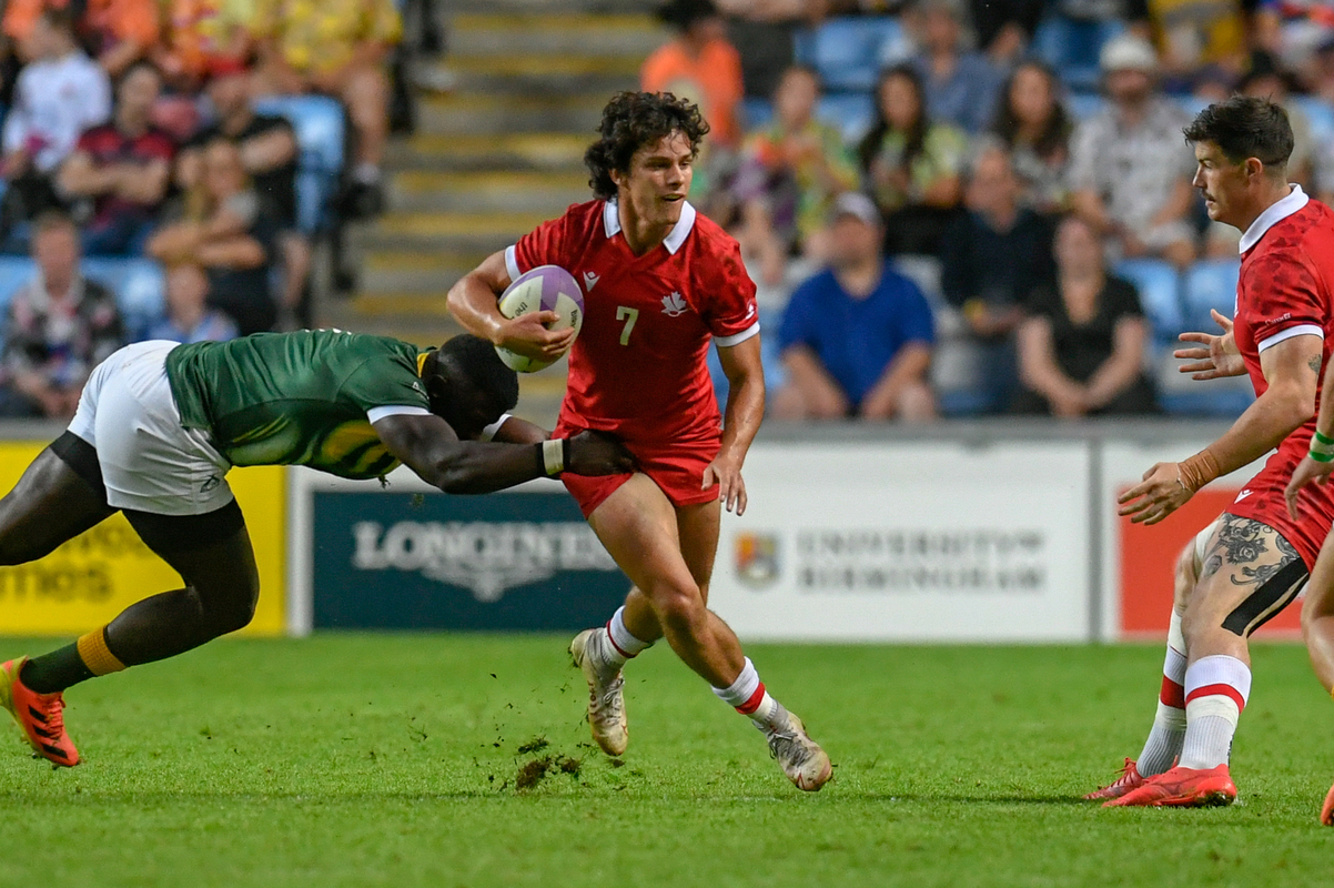 A Canada Men's 7s Player carries the ball during the 2022 Commonwealth Games