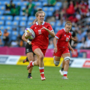 A Canada 7s player carries the ball during the 2022 Commonwealth Games
