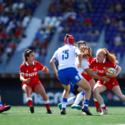 Canada winger Paige Farries carries the ball through the Italy defence
