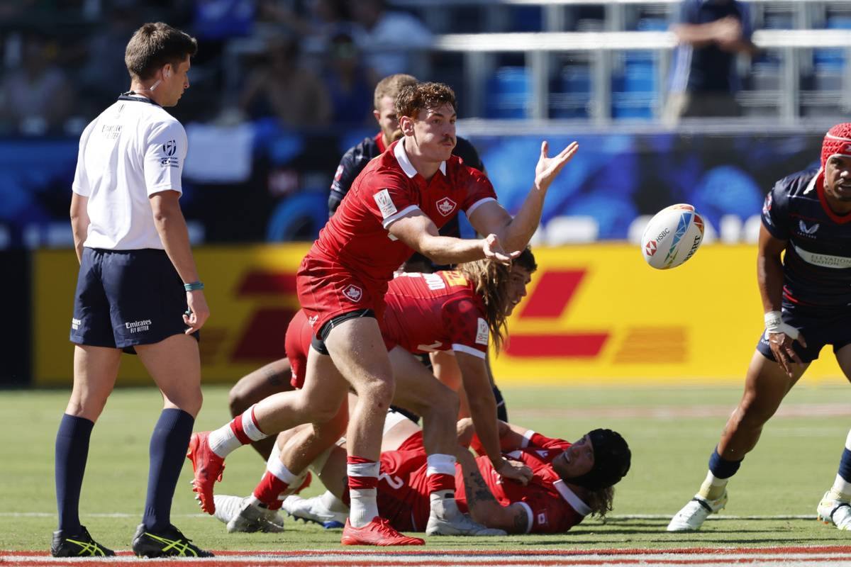 A Canada Men's 7s Player throws the pall from the breakdown during a match against USA at the 2022 LA Sevens