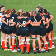 The Canada Women's Rugby Team huddles before its Rugby World Cup Semi-Final against England
