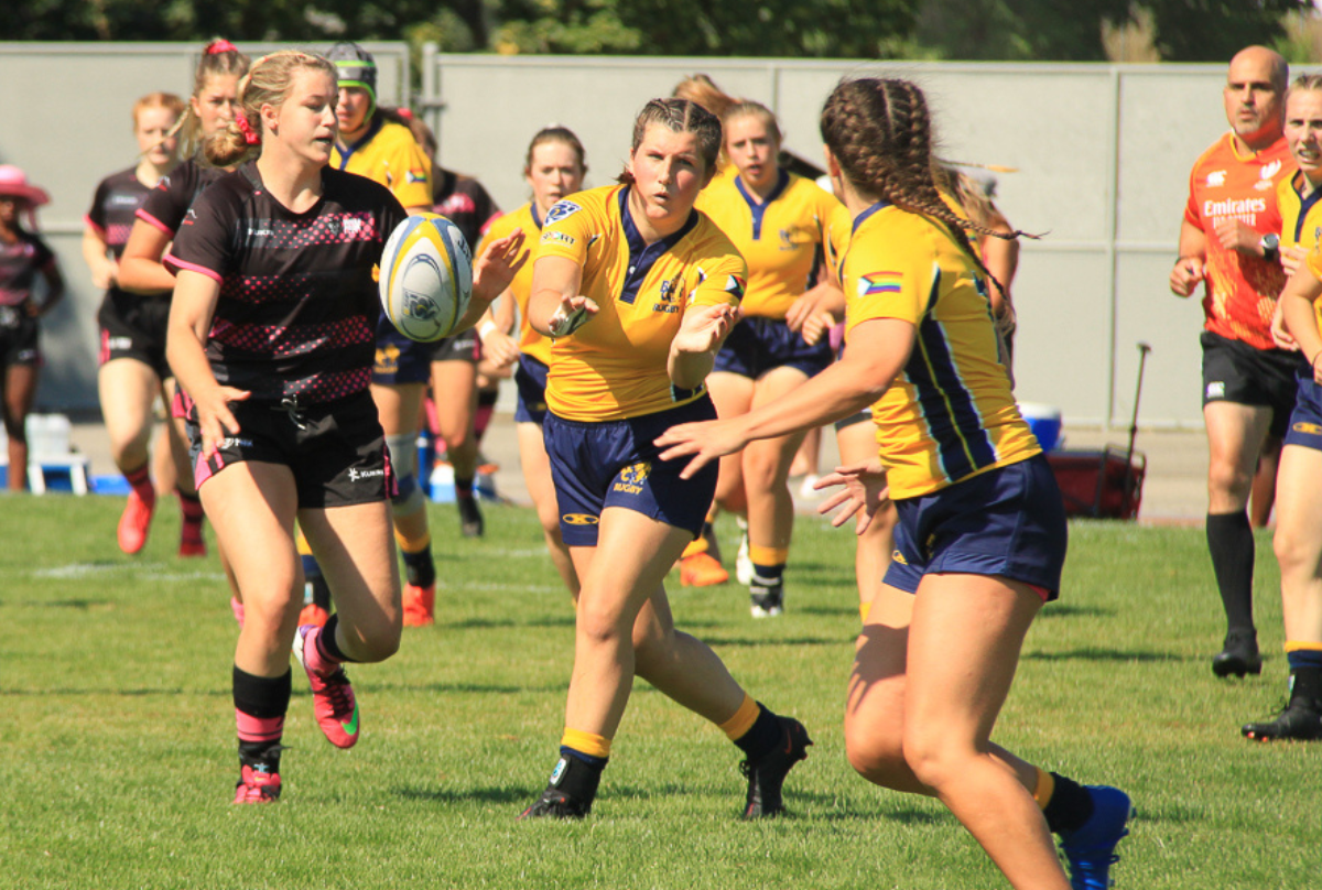 A BC Bears u18 female player throws the ball to a team mate during the 2022 Western Canadian Championships