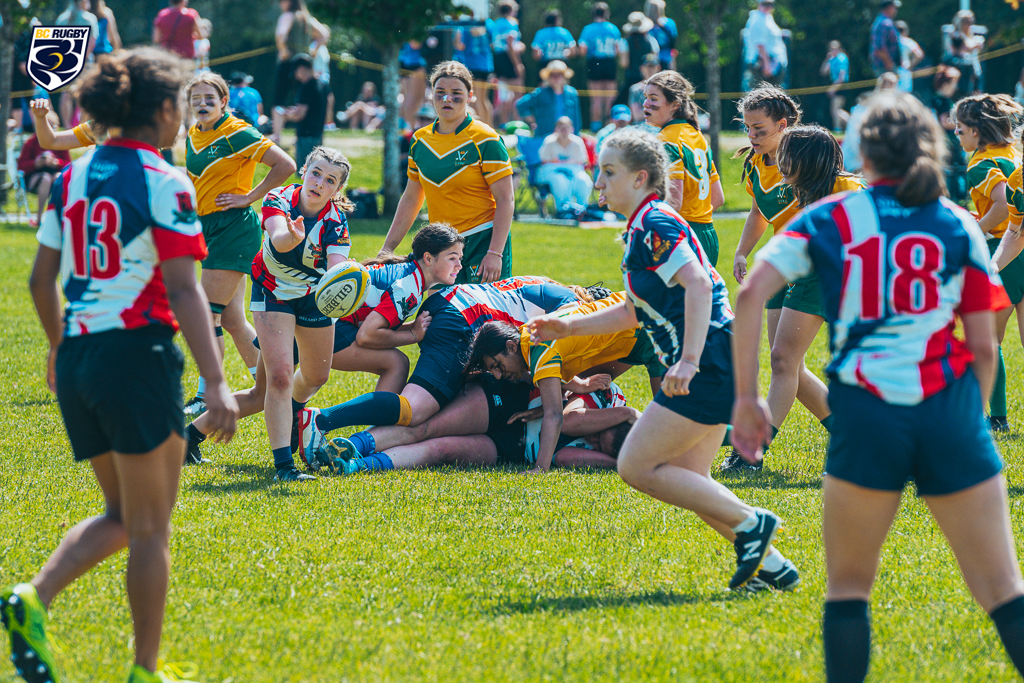 A female player passes the ball to a teammate at the 2022 Provincial Regional Championships