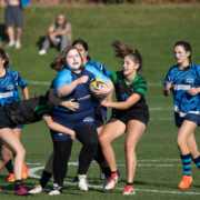 A player runs with the ball during a U14 Girls match at the 2022 Kamloops 7s