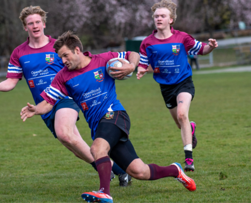 A United RFC player dashes for the try line