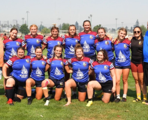 The United RFC Women's 7s team poses for a photo