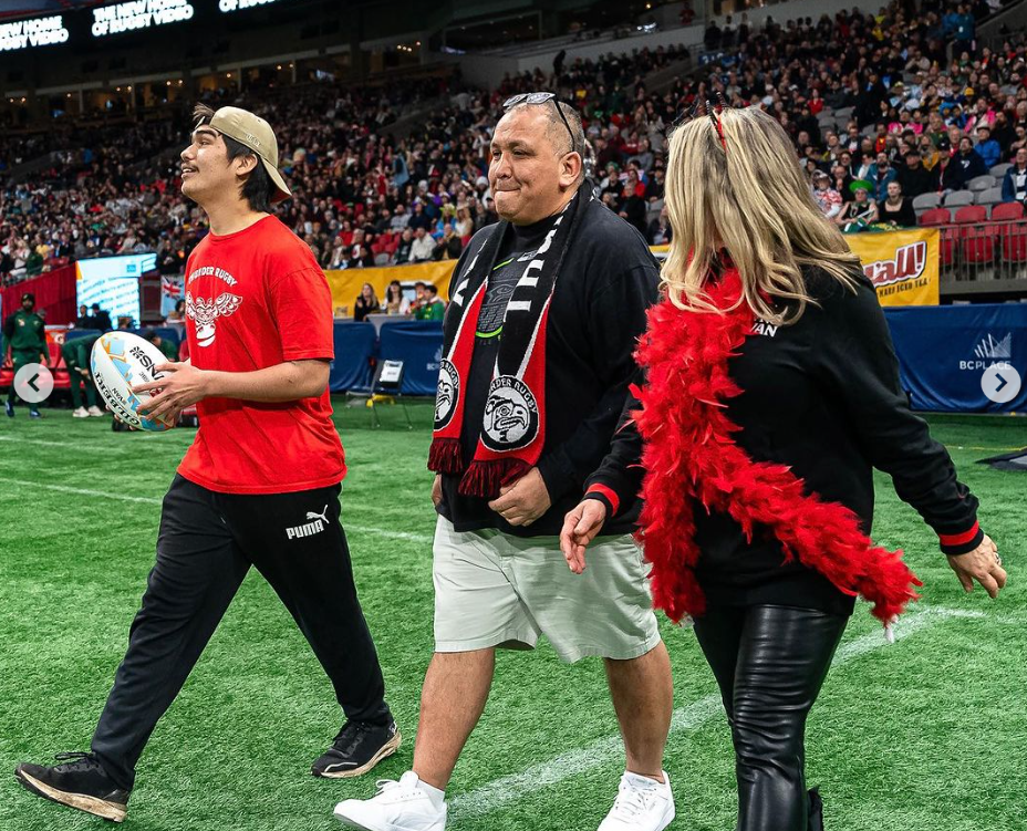 Thunder Rugby Director John Lyall and his nephew carries the match ball to the pitch at the 2024 HSBC SVNS Vancouver